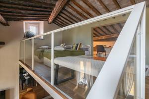 Katil atau katil-katil dalam bilik di Il Parione Luxury Apartment with view, Florence