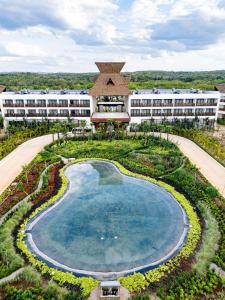 Bazén v ubytování Hotel Mundo Maya Nuevo Uxmal nebo v jeho okolí