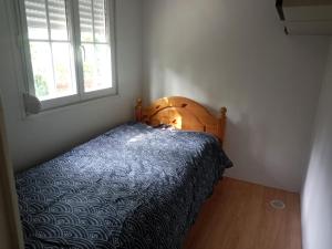 Ένα ή περισσότερα κρεβάτια σε δωμάτιο στο Mobil home