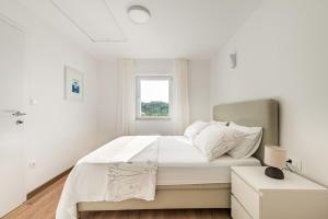Katil atau katil-katil dalam bilik di Holiday house ISA +47 gambar