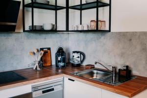 Køkken eller tekøkken på Ferienwohnung - Zur Waldruhe