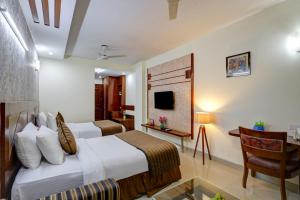 Hotel Bstays Iffco Metro, Near Fortis Hospital -Gurugram客房内的一张或多张床位