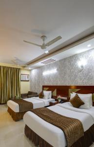 Hotel Bstays Iffco Metro, Near Fortis Hospital -Gurugram客房内的一张或多张床位