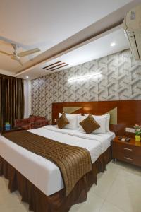 Hotel Bstays Iffco Metro, Near Fortis Hospital -Gurugram客房内的一张或多张床位