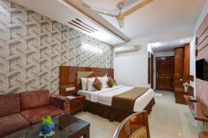 Hotel Bstays Iffco Metro, Near Fortis Hospital -Gurugram客房内的一张或多张床位
