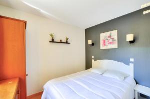 Postel nebo postele na pokoji v ubytování La résidence du Lac - maeva Home - Appartement 2 pièces 4 personnes - Prestige MAE-5513