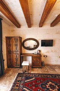 TV a/nebo společenská místnost v ubytování Nest Cappadocia Hotel