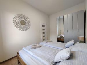 Posteľ alebo postele v izbe v ubytovaní Elements Apartments & Renata