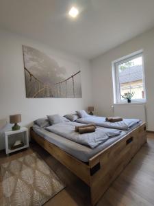 Posteľ alebo postele v izbe v ubytovaní Elements Apartments & Renata