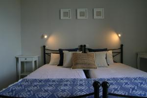 two beds sitting next to each other in a bedroom at Vasilina in Faliraki +29 photos