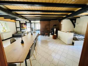 a large room with a long table and chairs at Traumhaus mit mega top specials in Lahnstein