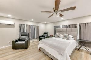 a bedroom with a bed and a ceiling fan at Private Yard: Pet-Friendly Studio in New Boston! in New Boston