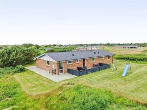 an aerial view of a brick house in a field at 286-Ringkobing-Vestklitvej-14 in Ringkøbing