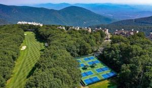 an aerial view of a mansion in the mountains at Dobie 48 with Wintergreen Advantage in Wintergreen +3 photos