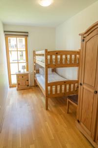 Voodi või voodid majutusasutuse Jana 2 by SMR Rauris Apartments - inc Spa and near Gondola toas