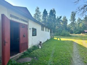 Zahrada ubytování Karlsäter - Timmerstugan + 12 fotografií