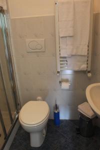a bathroom with a toilet and a sink at B&B I' Chivi in Incisa in Valdarno +12 photos