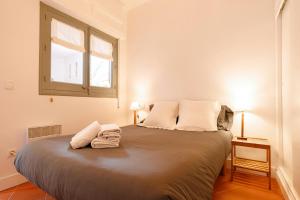 Ένα ή περισσότερα κρεβάτια σε δωμάτιο στο T1· Family Getaway 50m from the Beach