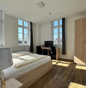 Postel nebo postele na pokoji v ubytování Wachtendonker Hof