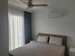 Postel nebo postele na pokoji v ubytování Royal Sun Elite Iskele - Luxury Apartments + 45 fotografií