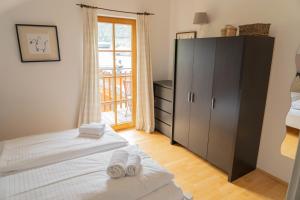 Posteľ alebo postele v izbe v ubytovaní Eva Maria 7 by SMR Rauris Apartments - inc Spa and near Gondola