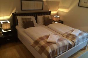 Posteľ alebo postele v izbe v ubytovaní Eva Maria 7 by SMR Rauris Apartments - inc Spa and near Gondola