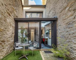 Patio nebo venkovní prostory v ubytování Havre de paix en plein cœur de Fontainebleau