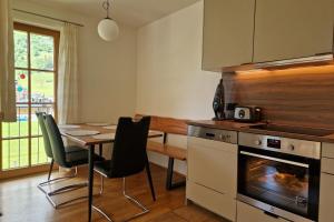 Kuchyň nebo kuchyňský kout v ubytování Eva 4 by SMR Rauris Apartments - close to Spa and Gondola + 61 fotografií