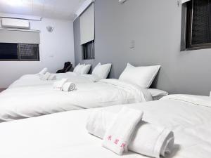華山禾園親子民宿客房内的一张或多张床位