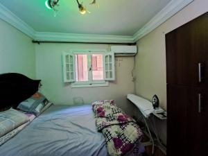 Postel nebo postele na pokoji v ubytování KENZY Apartment