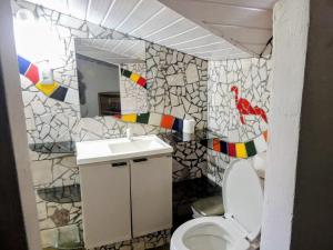 Ένα μπάνιο στο O Pharol Hostel e Pousada