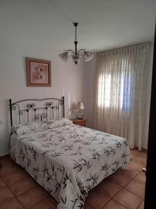 Ένα ή περισσότερα κρεβάτια σε δωμάτιο στο Beautiful Andalusian House Tradition & Confort