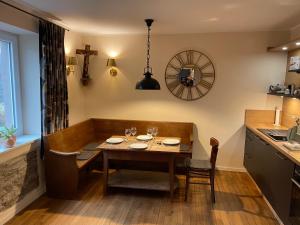 a dining room with a table with glasses on it at Seveniger Mühle in Sevenig