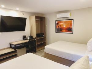 Postel nebo postele na pokoji v ubytování Comfort Inn Hermosillo Pitic