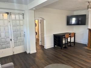 an empty room with a desk and a mirror at Apartment in Newark in Newark +5 photos