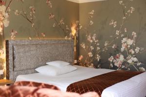 Postel nebo postele na pokoji v ubytování Hotel Waldkrug