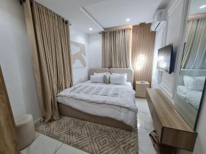 Postel nebo postele na pokoji v ubytování Zendidis Luxury Apartment