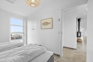 Кровать или кровати в номере 1110-Ringkobing-Hjelmevej-145-a