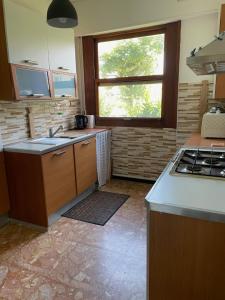 Kuchyň nebo kuchyňský kout v ubytování Da Angy