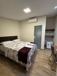 Chácara e Pousada Paraíso房間的床