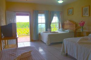 Ein Bett oder Betten in einem Zimmer der Unterkunft Sea Eye Hotel - Laguna Building