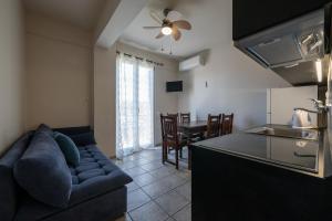 Kuchyň nebo kuchyňský kout v ubytování Mythos Suites-Poseidon apartment