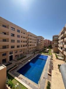 an overhead view of an apartment complex with a swimming pool at Nice apartment in Marrakesh in Marrakesh