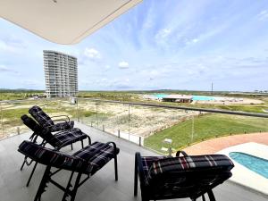 Πισίνα στο ή κοντά στο Departamento panorámico Bari 201 en Karibao