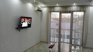 Телевізор і / або розважальний центр в Apartment Melashvili 4