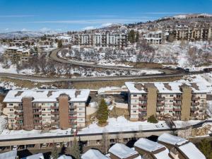an aerial view of a building in the snow at Ski In, Ski Out, Ski Slope Views, California King, Recently Renovated in Steamboat Springs