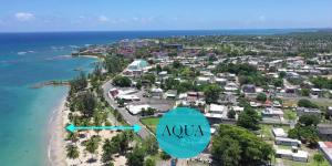 an aerial view of aquila resort on the beach at AQUA Villas Del Mar Apt 8 - 1BR Sun, Fun & Dining by the Shore in Dorado
