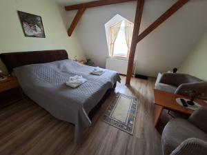 Postel nebo postele na pokoji v ubytování Hotel Alster