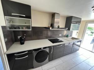 Køkken eller tekøkken på Maison de ville avec jardin