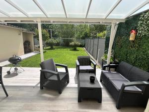 En have udenfor Maison de ville avec jardin